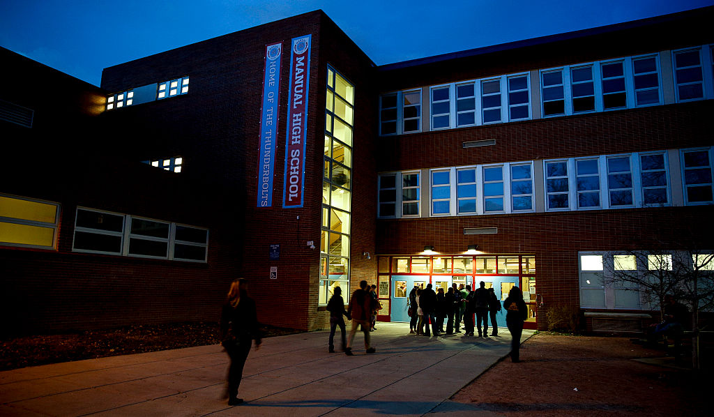 DENVER, CO - MARCH 1: Colorado Democrats file into Manual High School to cast their vote for their ...